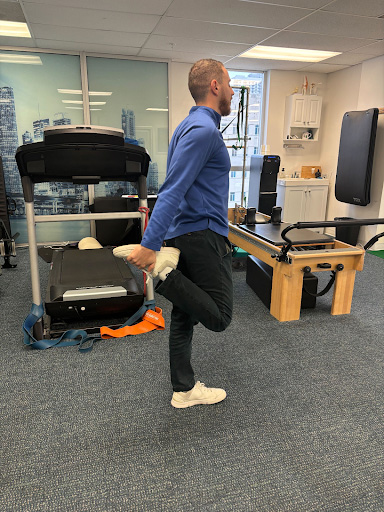 Standing Dynamic Quad Stretch